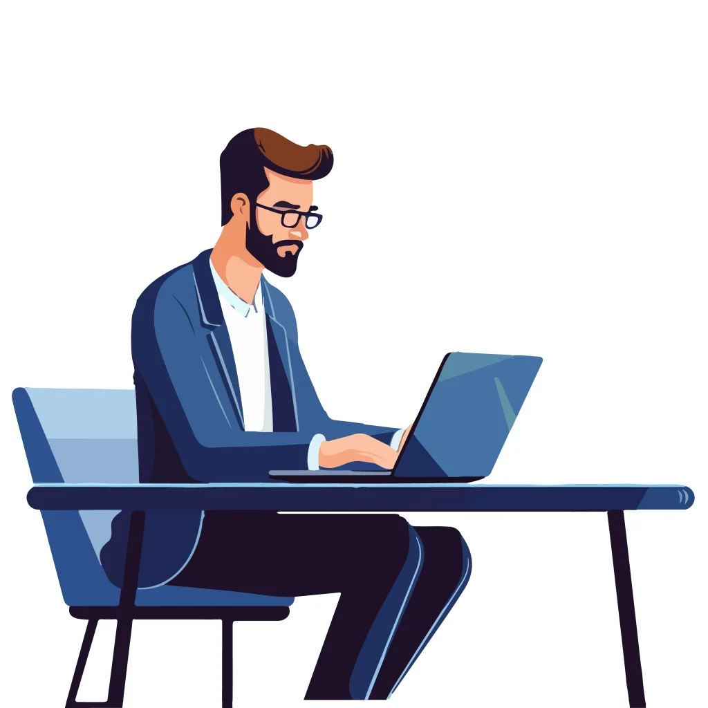 Hombre joven con barba trabajando desde una laptop en su escritorio